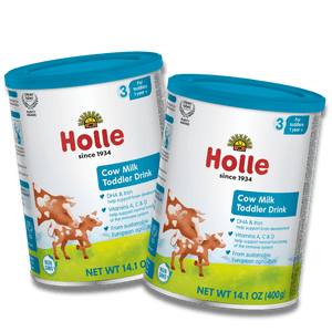 2 cow milk tins