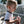 child enjoying zebra beet pouch. playing with zebra beet pouch in-hand